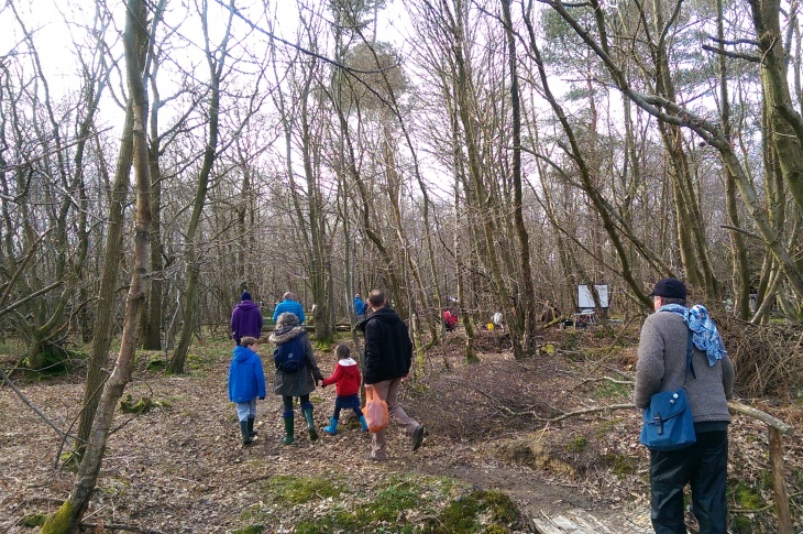People walking into the Woodland Project Celebration Event